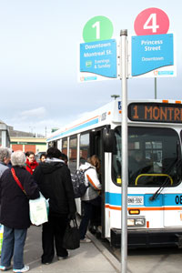 Transit riders boarding a bus